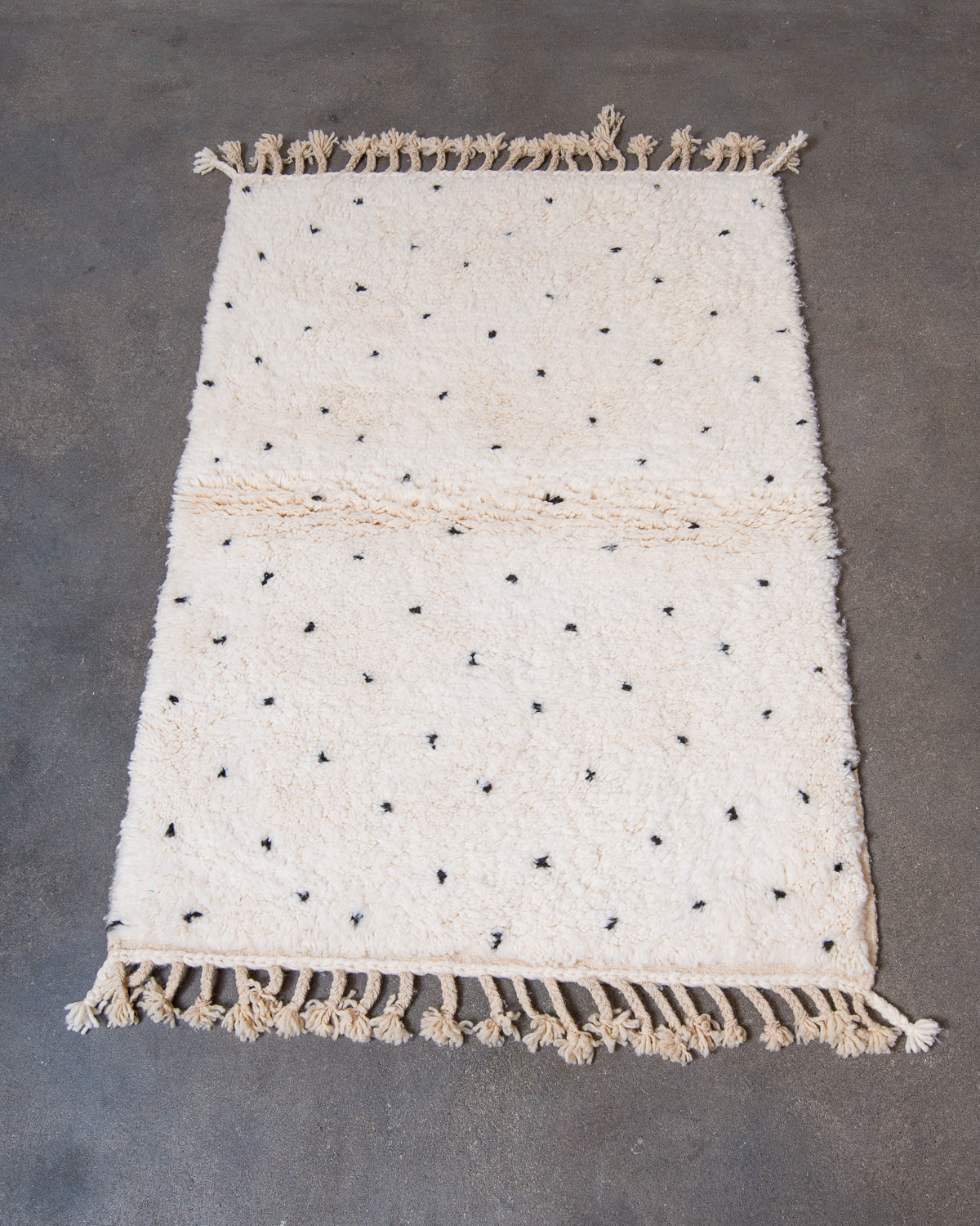 Modern, designer, handcrafted Berber rug from Morocco. Beniourain carpet with beautiful colours and patterns and fluffy wool texture.